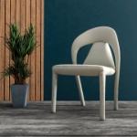 Picture of Dining Chair Upholstered in Leather with Steel Legs and an Open Back Design