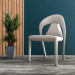 Picture of Dining Chair Upholstered in Leather with Steel Legs and an Open Back Design