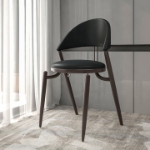 Picture of Dining Chair Upholstered Leather in Iron With an Open Curved Back Design