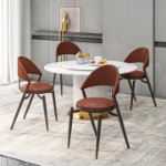 Picture of Dining Chair Upholstered Leather in Iron With an Open Curved Back Design